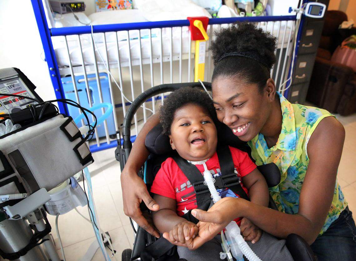 Antoinise Augstine with her 17-month-old Samuel at their small North Miami apartment in December 2017.