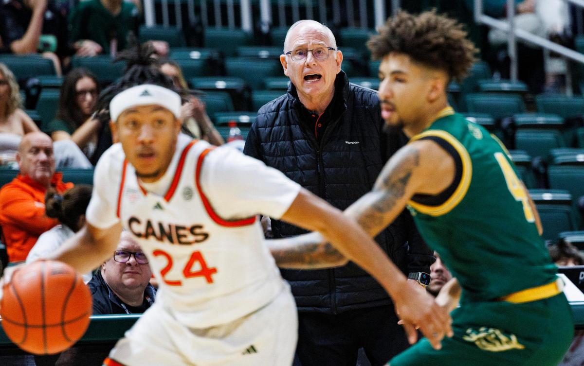 Hurricanes Head Coach Jim Larrañaga yells to the team while Nijel Pack (24) takes the ball down the court during the second half of a game against Saint Leo on Wednesday, Oct. 30, 2024, at Watsco Center at the University of Miami in Coral Gables, Fla.