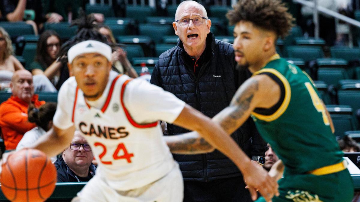 Hurricanes Head Coach Jim Larrañaga yells to the team while Nijel Pack (24) takes the ball down the court during the second half of a game against Saint Leo on Wednesday, Oct. 30, 2024, at Watsco Center at the University of Miami in Coral Gables, Fla.