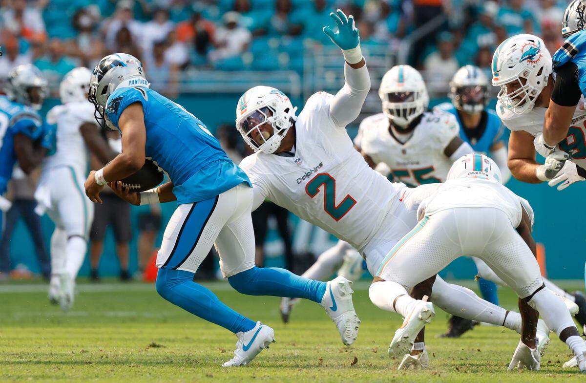 Miami Dolphins linebacker Bradley Chubb (2) pressures Carolina Panthers quarterback Bryce Young (9) in the third quarter at Hard Rock Stadium in Miami Gardens on Sunday, October 15, 2023.