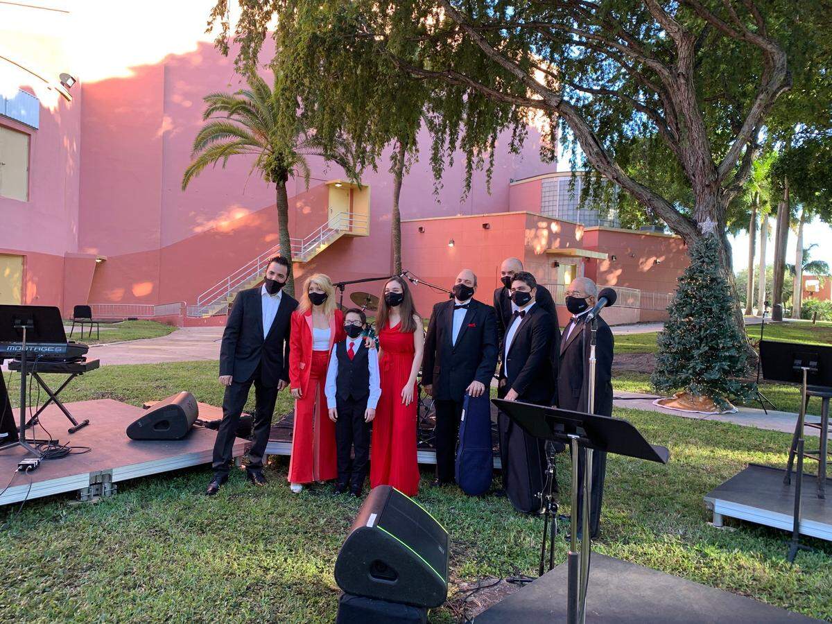 The Florida Chamber Orchestra, featuring young violinist Diego Varela, performed “Christmas is in the Air with Hopes” at a Miami-Dade County Auditorium free drive-thru event. The venue will continue to host outdoor performances in 2021.