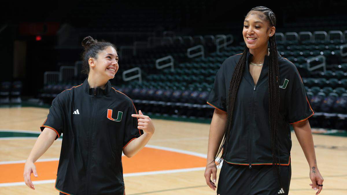 Miami Hurricanes guard Gal Raviv (left) speaks to center Ra Shaya Kyle (right) after practice at the Watsco Center in Coral Gables, Florida, Tuesday, October 28, 2025.