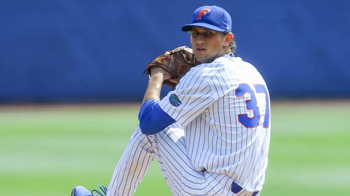 Florida's Jackson Kowar pitches during the first inning of a Southeastern Conference tournament NCAA baseball game against Arkansas, Friday, May 25, 2018, in Hoover, Ala.