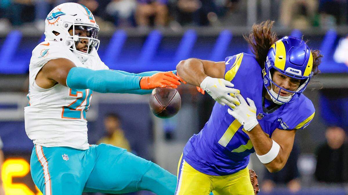 Miami Dolphins linebacker Jordyn Brooks (20) defends Los Angeles Rams wide receiver Puka Nacua (17) for an incomplete pass in the first half during their NFL football game at SoFi Stadium in Inglewood, California on Monday, November 11, 2024. 