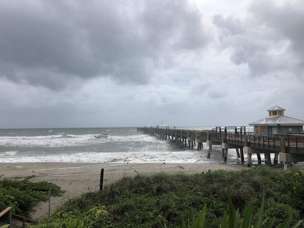 The ocean churns at the Juno Beach Pier on Monday, Sept. 2.