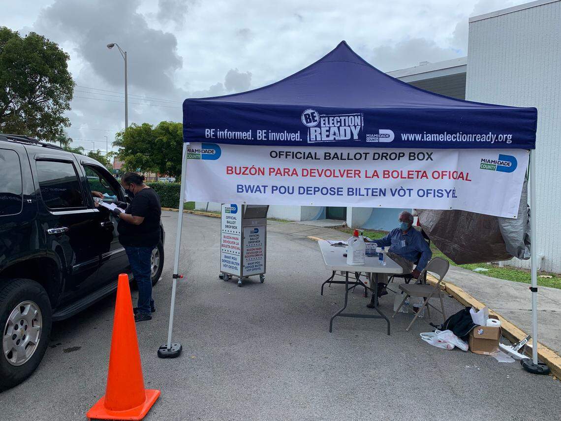 The voter’s mail-in ballot drop-off box at Kendall Branch Library at 9101 SW 97th Ave. in Miami, seen here on Oct. 22, 2022, has a drive-thru lane where a poll worker will check to make sure you signed the outside of your envelope and drop it into the box for you. Or you can walk up and drop it into the drop-off box during early voting hours of 7 a.m.-7 p.m. through Nov. 1 in Miami-Dade and Broward.