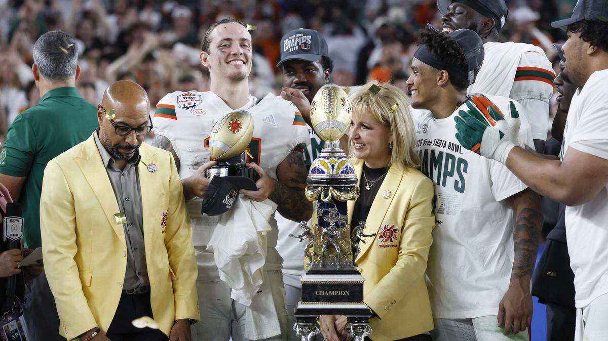 Miami Hurricanes quarterback Carson Beck (11) wins Offensive MVP after defeating the Mississippi Rebels during the College Football Playoff semifinal at the Fiesta Bowl in State Farm Stadium on Friday, January 9, 2026 in Glendale, Arizona.