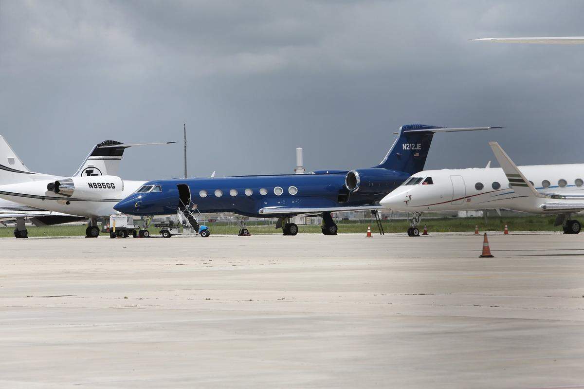 Jeffrey Epstein’s private plane, which is painted a distinctive shade of blue, is parked at Palm Beach International Airport Thursday morning, May 24, 2018. The plane landed at the airport Wednesday May 23, 2018.