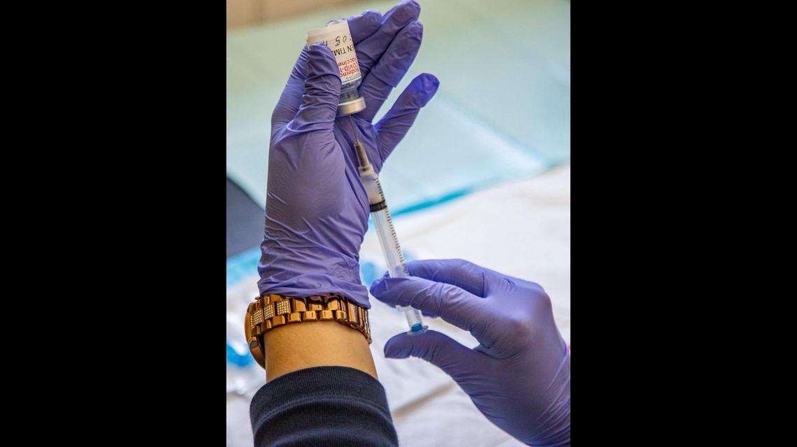 Moderna COVID-19 vaccinations are administered to residents, staff and families at Chapman Partnership, a homeless shelter, on Thursday, April 22, 2021.