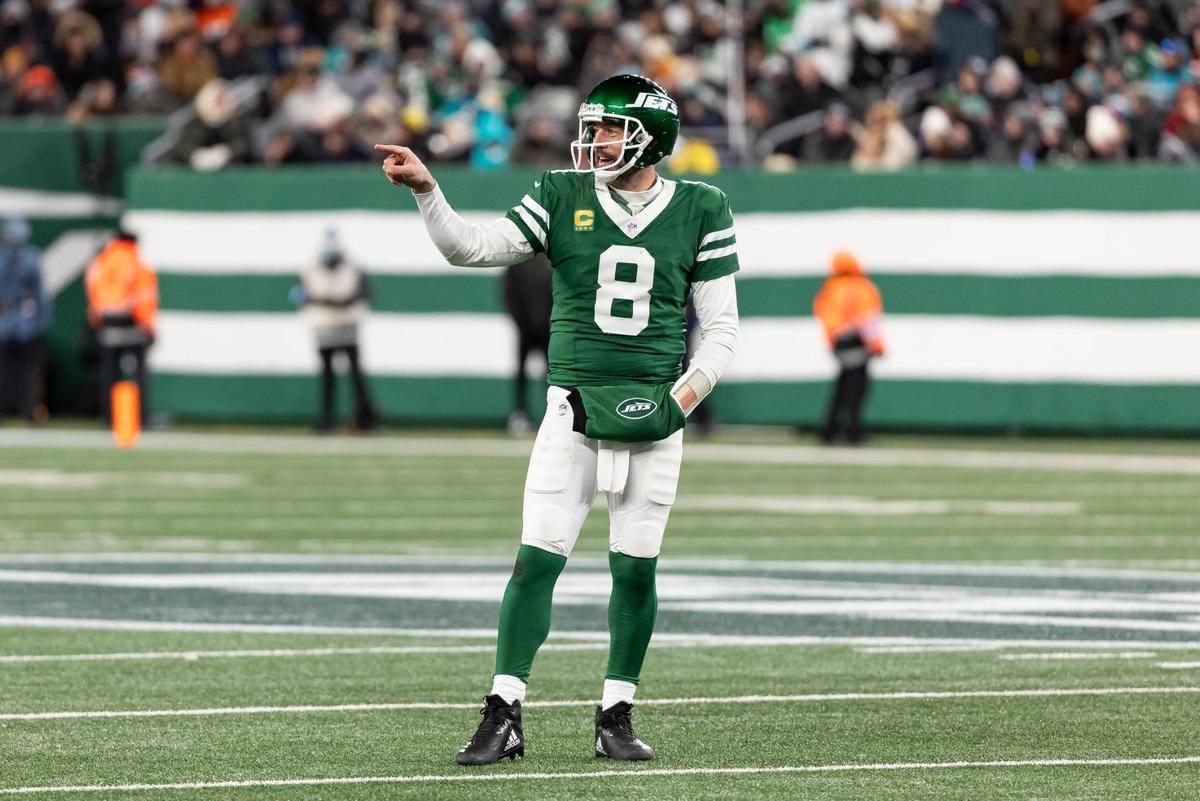 New York Jets quarterback Aaron Rodgers (8) reacts toward the Miami Dolphins sideline after they challenged a play play in the second half of their NFL game at the MetLife Stadium on Sunday, Jan. 5, 2025, in East Rutherford, N.J.