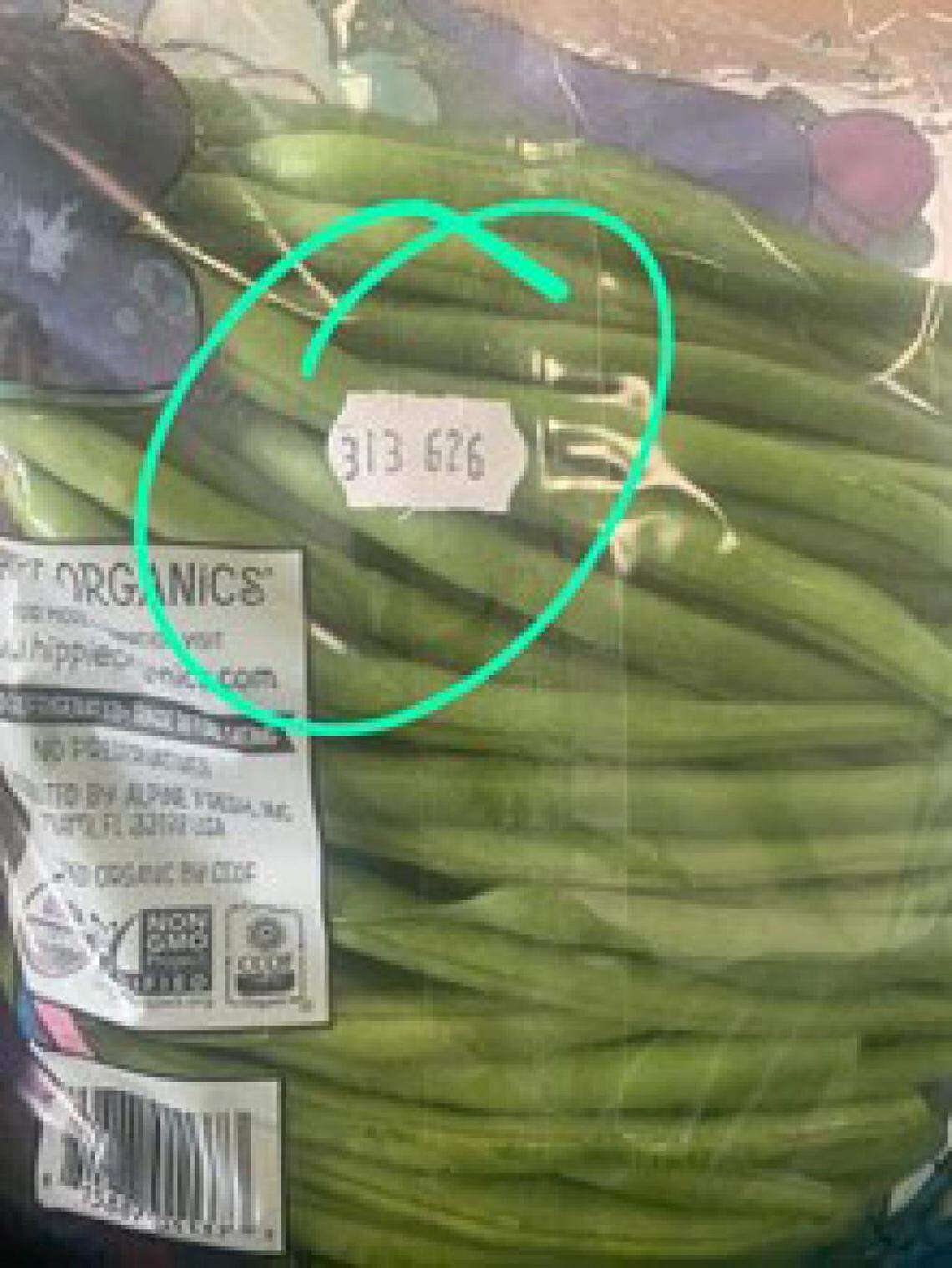 The recalled lot number 313-626 is printed on the back of the one pound, clear plastic packages of Hippie Organics French Beans on a small white label.