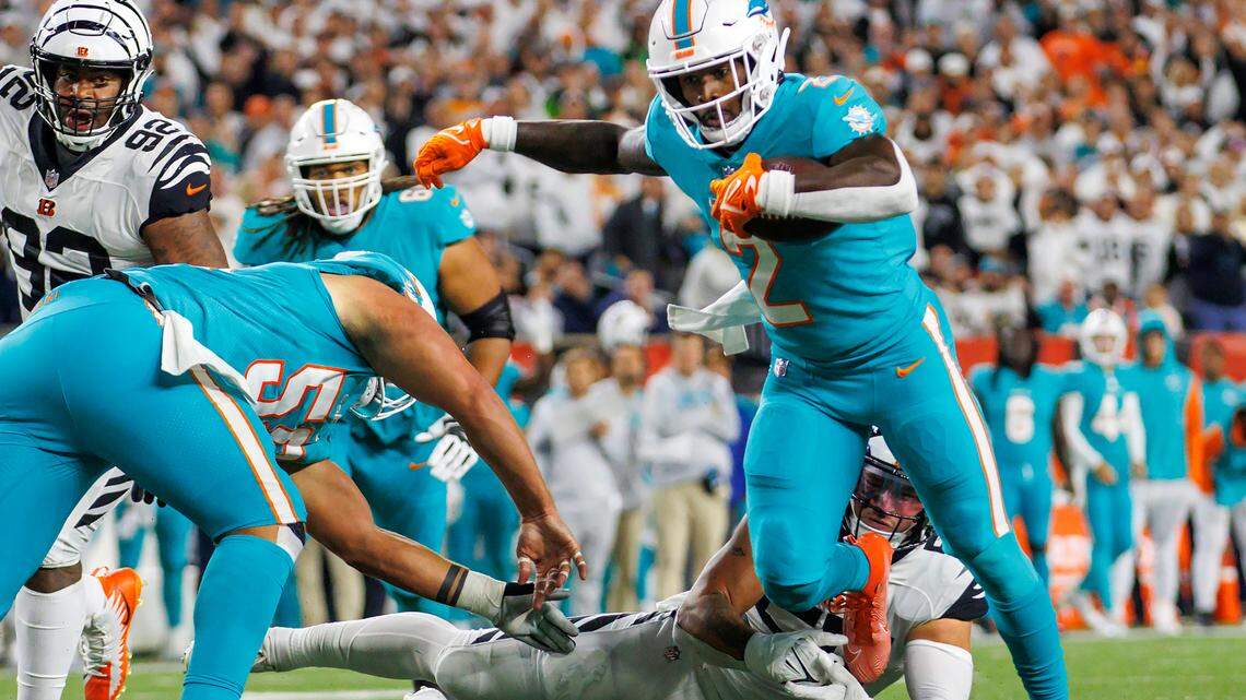 Miami Dolphins running back Chase Edmonds (2) runs to scores a touchdown during the second quarter of an NFL football game against the Cincinnati Bengals at Paycor Stadium on Thursday, September 29, 2022 in Cincinnati, Ohio.