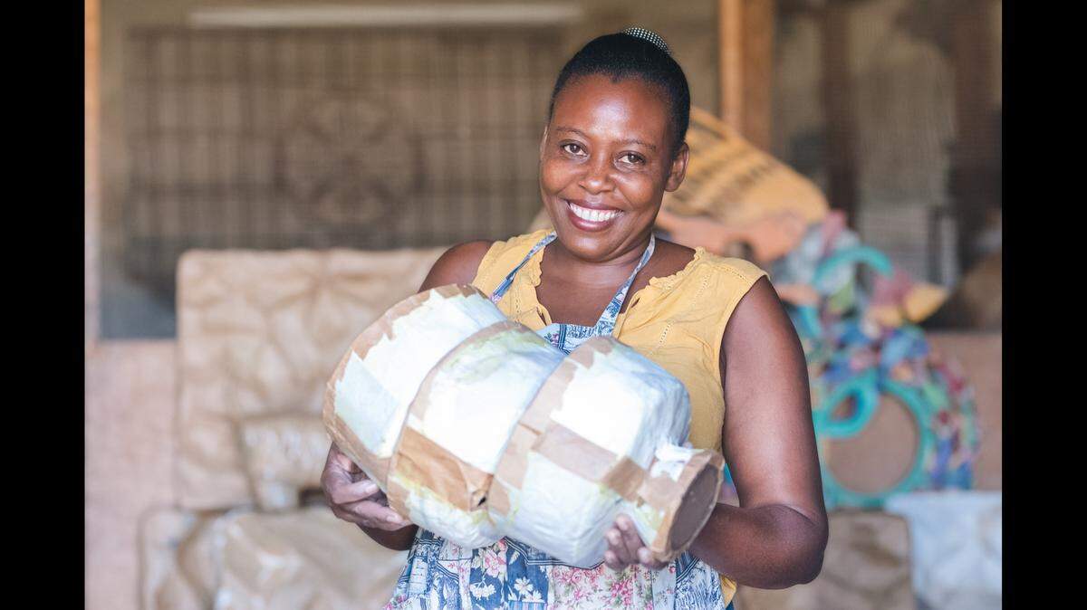 Papier-mâché sculptor Josette Morency is one of 16 Caribbean Craft artisans featured in the “Window of Hope” exhibition at Aventura Mall, Sept. 1-10. Artwork in the show reflects Haitian culture and heritage.