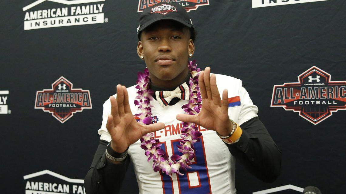 Bishop Gorman High School tight end Brevin Jordan, who will arrive at the University of Miami on Monday to start his college education and football career, receives his honorary All America Game jersey at his school Wednesday, Oct. 25, 2017, in Las Vegas.