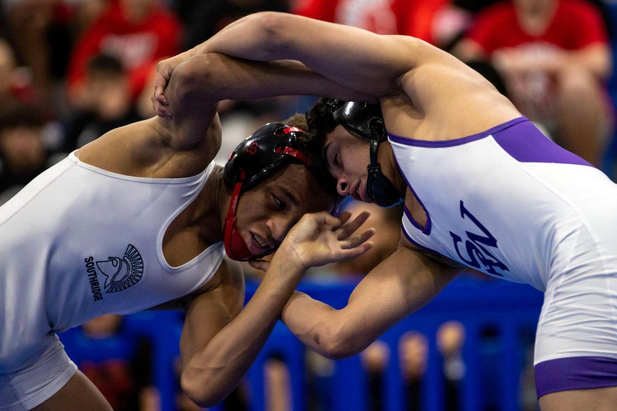 Miami South Ridge’s Fredrick Mitchum wrestles with Southwest Miami’s Gabriel Tellez during the 2023 Boys GMAC Wrestling Championships at South Dade Senior High School in Homestead, Florida, on Saturday, February 4, 2023.