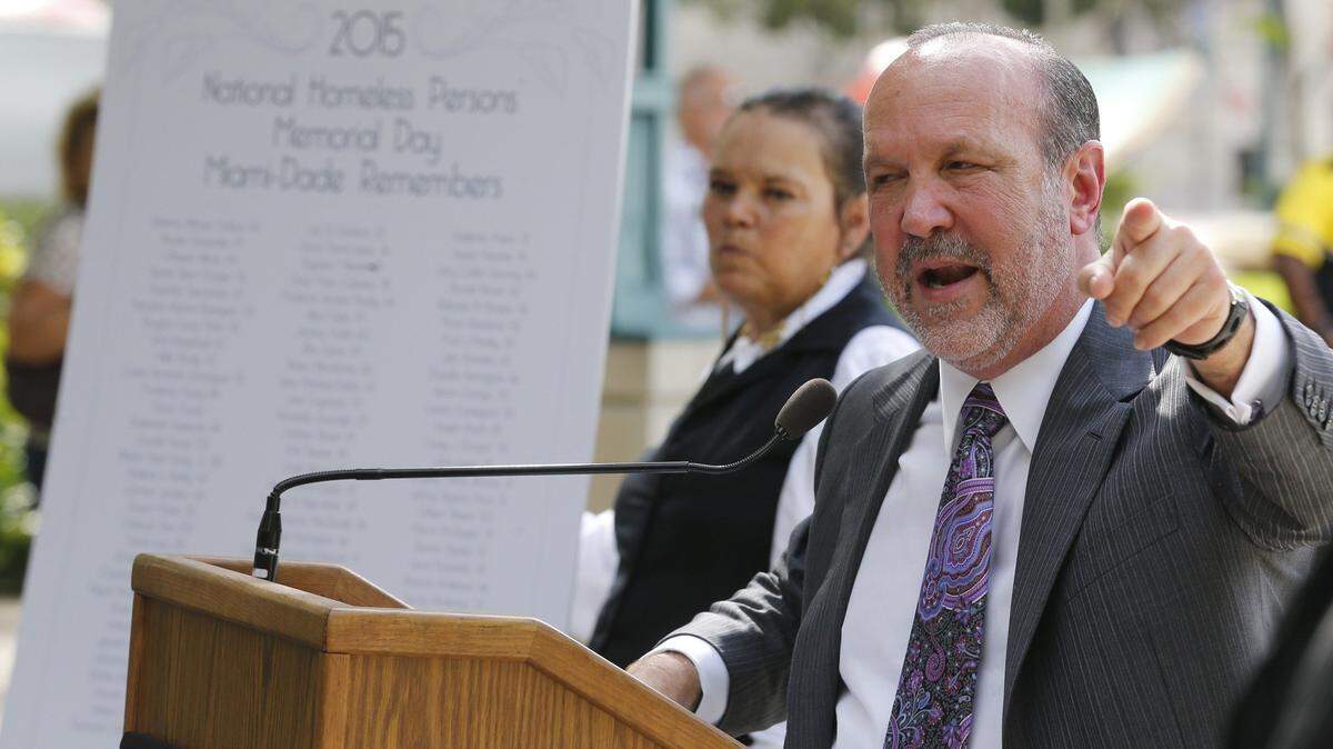 Ron Book, chairman of Miami-Dade County’s homeless board, said he’s taken an ‘extremely hard line’ against spending local dollars to house recent migrants to the Miami area. He said housing them is the responsibility of the federal government.