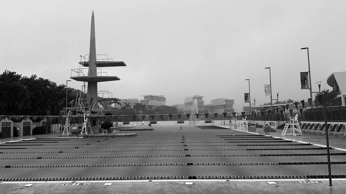 Rain arrived as forecast early Friday afternoon at the University of Miami’s UC pool in Coral Gables on March 13, 2026. Hurricane swimmers and divers still had practice.