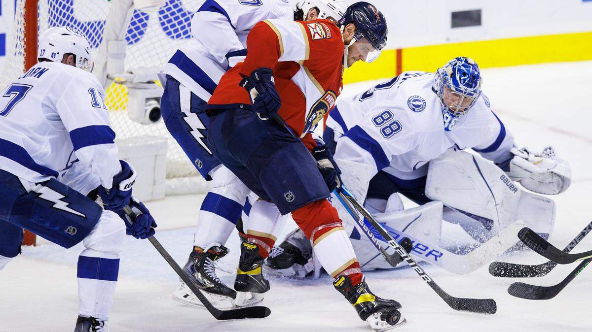 Tampa Bay Lightning goaltender Andrei Vasilevskiy (88) defenseman Ryan McDonagh (27) and left wing Alex Killorn (17) defend the goal from Florida Panthers center Aleksander Barkov (16) during the third period of Game 1 of a second round NHL Stanley Cup series at FLA Live Arena on Tuesday, May 17, 2022 in Sunrise, Fl.