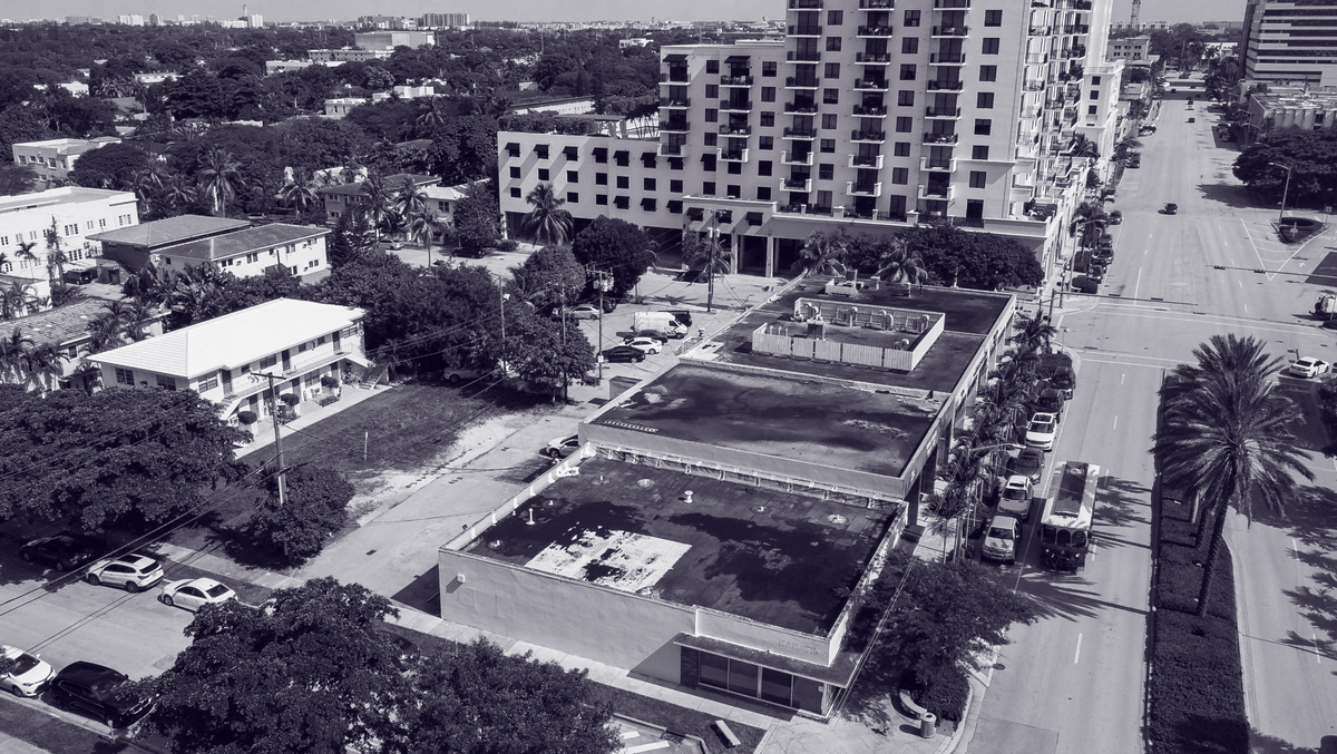 An aerial view of 1424 Ponce de Leon Blvd, which is partly owned by Coral Gables Mayor Vince Lago on Monday, Aug. 14, 2023, in Coral Gables, Fla. Developer Rishi Kapoor had been renting the property from the mayor, with plans to use it as a sales center for his 1505 Ponce project directly across the street.