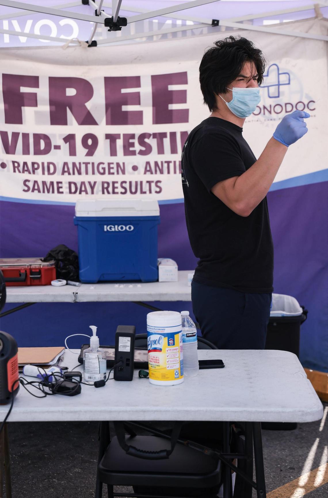 Blue Med Consultants employee Zackary Maldonado, 21, has seen a serious drop in the numbers of people seeking COVID-19 tests this year compared to last fall, but he said numbers have slowly been rising a bit at the testing site near the intersection of Biscayne Boulevard and Northeast 116th Street in North Miami, Florida.