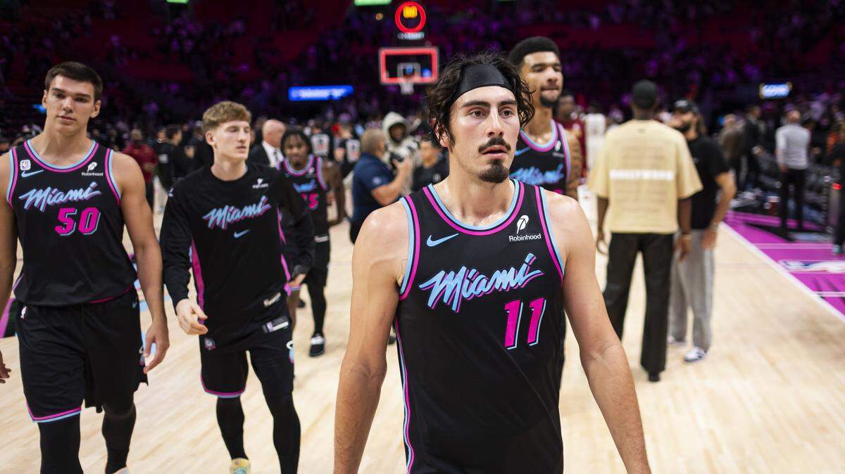 Miami Heat forward Jaime Jaquez Jr. (11) walks off the court with his teammates after losing his NBA game against the Cleveland Cavaliers in the second half of their NBA game at Kaseya Center on Nov. 12, 2025, in Miami.