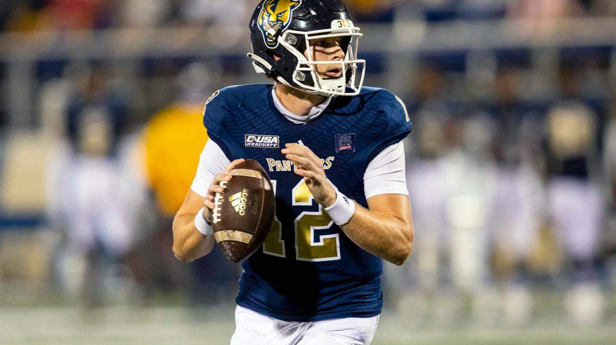 Florida International University quarterback Max Bortenschlager (12) prepares to throw the ball during the second half of the ’2020 Shula Bowl’ against Florida Atlantic University at Riccardo Silva Stadium, in Miami, Florida, on Friday, November 13, 2020.