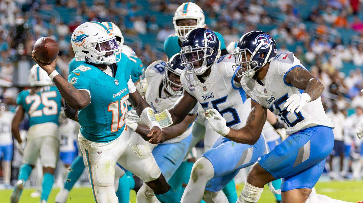 Tennessee Titans linebackers Harold Landry III (58) and Kenneth Murray Jr. (56) put pressure on Miami Dolphins quarterback Tyler Huntley (18) in the second half of their NFL game at Hard Rock Stadium on Monday, Sept. 30, 2024, in Miami Gardens, Fla.
