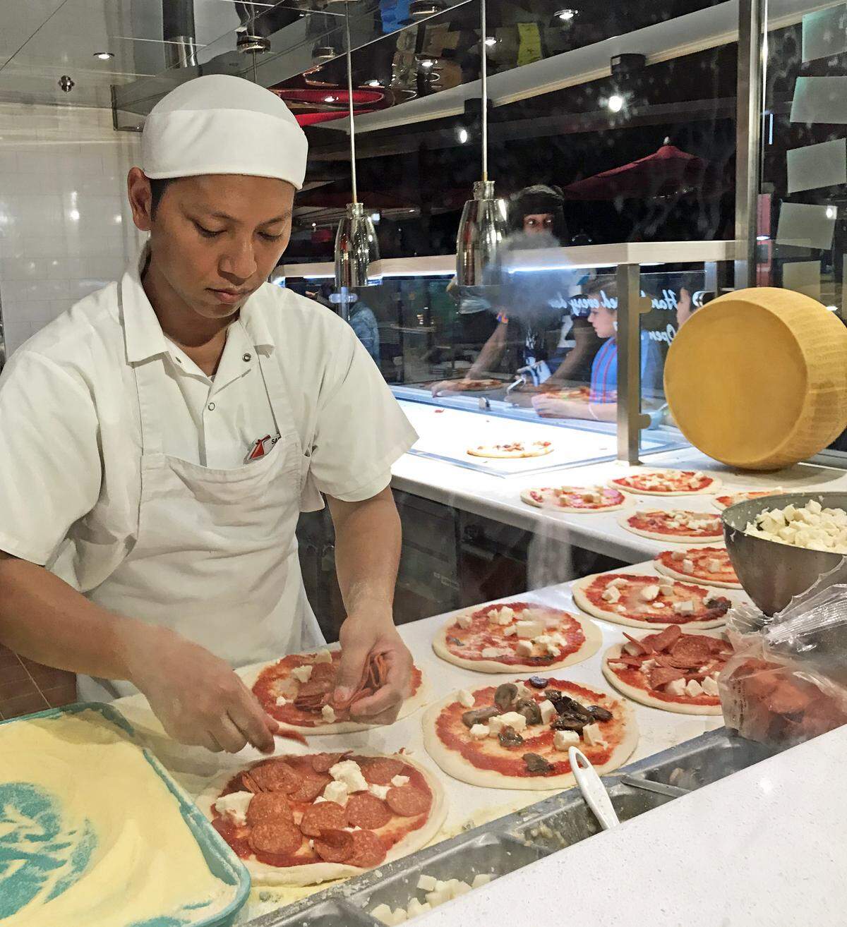 The pizzeria on the pool deck of Carnival Horizon is open 24 hours.