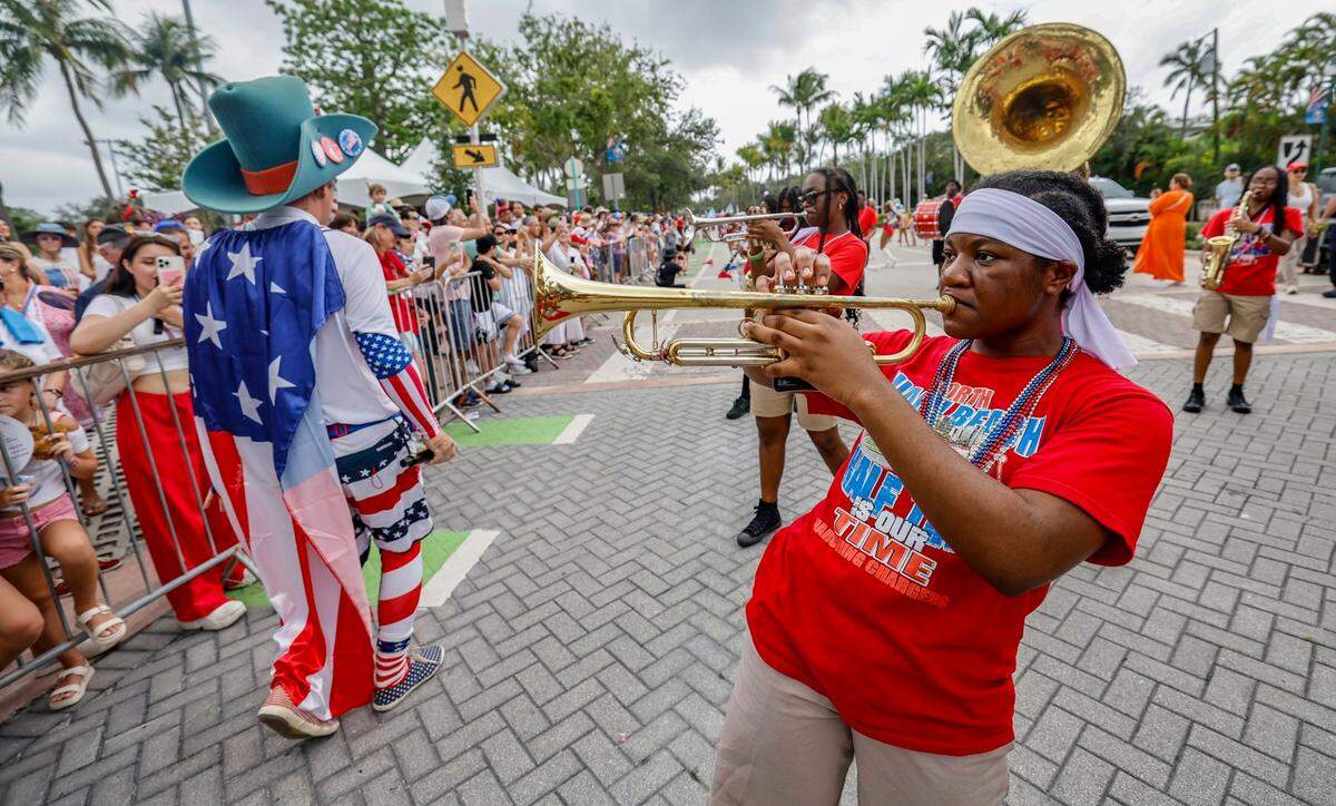 The North Miami Beach Marching Chargers perform as residents, family and friends celebrate Independence Day during the 66th Annual Key Biscayne Fourth of July Parade on Key Biscayne, Florida on Friday, July 4, 2025.