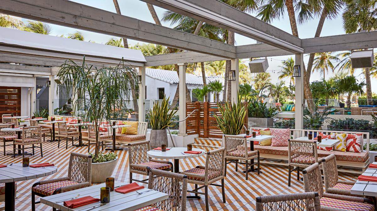 The outdoor terrace at Ambersweet, the new restaurant at The Confidante Miami Beach.