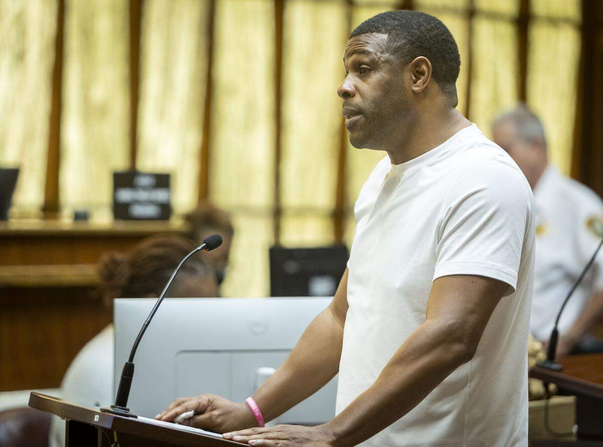 Miami, FL, October 28, 2025 - Earl Little, retired NFL player and friend of Marlin Barnes, reads his impact statement to jurors during court proceedings. Jurors will decide if Labrant Dennis, convicted of fatally bludgeoning his ex-girlfriend Timwanika Lumpkins and Barnes, a UM football player at the time of their 1996 murders, will be sent back to Florida’s Death Row.