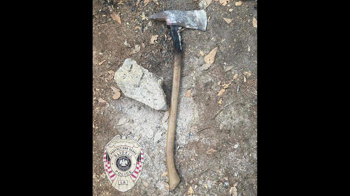 A suspect has been arrested, and police found an ax believed to be the weapon involved, officials said.