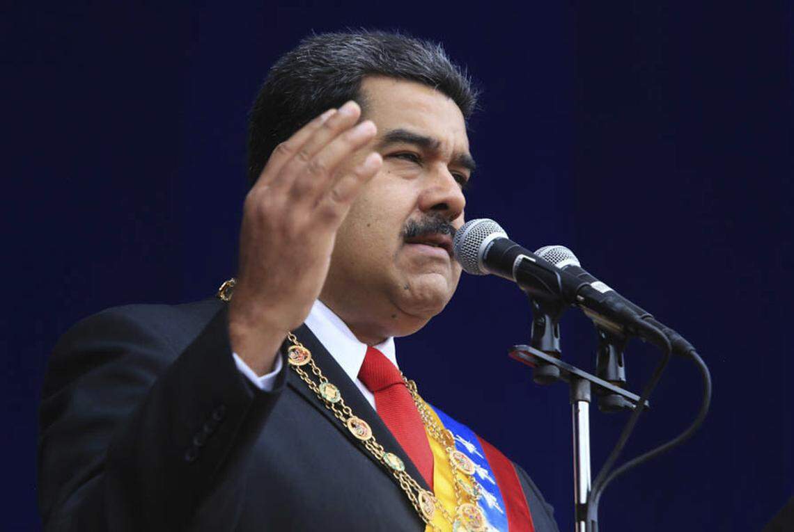 In this photo provided by the Miraflores Presidential Palace, President Nicolas Maduro speaks during a event marking the 81st anniversary of the National Guard, in Caracas, Venezuela, Saturday, August 4, 2019. Venezuela’s government says several explosions heard at a military event were an attempted attack on President Maduro. Information Minister Jorge Rodriguez said in a live broadcast that several drone-like devices with explosives detonated near the president. He said Maduro is safe and unharmed but that seven people were injured. (Miraflores Presidential Palace via AP)