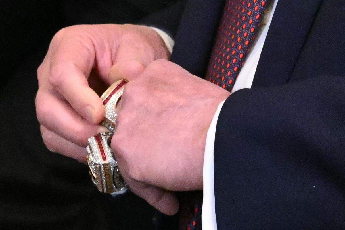 US President Donald Trump wears the champions rings during a congratulatory ceremony with the Florida Panthers of the National Hockey League, winners of the 2025 Stanley Cup, in the East Room of the White House in Washington, DC on January 15, 2026.