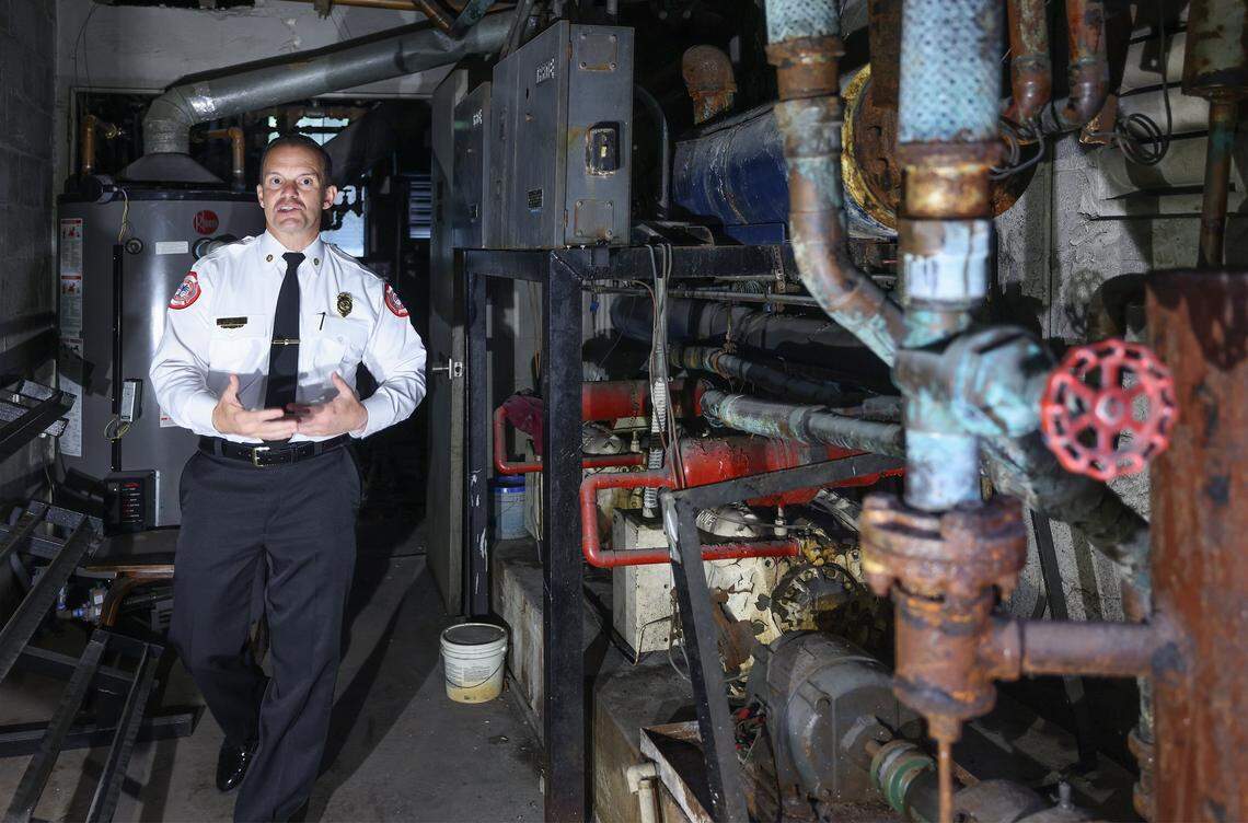 The City of Miami Fire Chief Robert Hevia tours the rusted, outdated boiler room at Fire Station 1, built in 1964, where mold, water intrusion, and outdated equipment are hampering effective emergency response and community safety during a press tour with the mayor and other officials. Miami Mayor Eileen Higgins toured the city's police and fire facilities in Miami, Florida on Monday, April 20, 2026. Higgins is proposing a general obligation bond to fund critical repairs and upgrades to aging public safety buildings, citing concerns over deteriorating conditions that threaten effective emergency response and community safety.