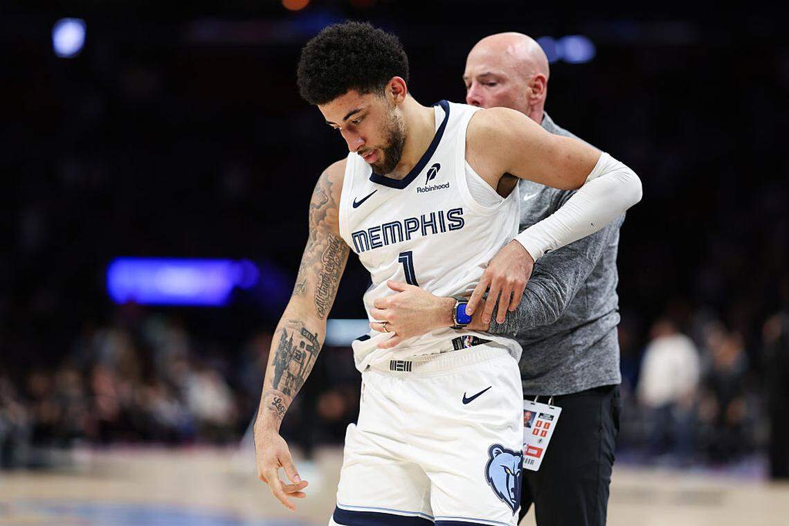 Scotty Pippen Jr. #1 of the Memphis Grizzlies reacts after a fight against the Miami Heat during the fourth quarter of the game at Kaseya Center on February 21, 2026 in Miami.
