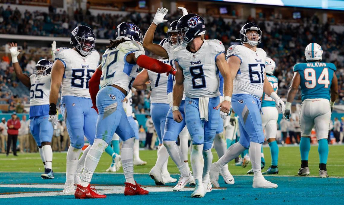 Tennessee Titans running back Derrick Henry (22) celebrates his touchdown with teammates in the fourth quarter against the Miami Dolphins at Hard Rock Stadium in Miami Gardens, Florida on Monday, December 11, 2023.
