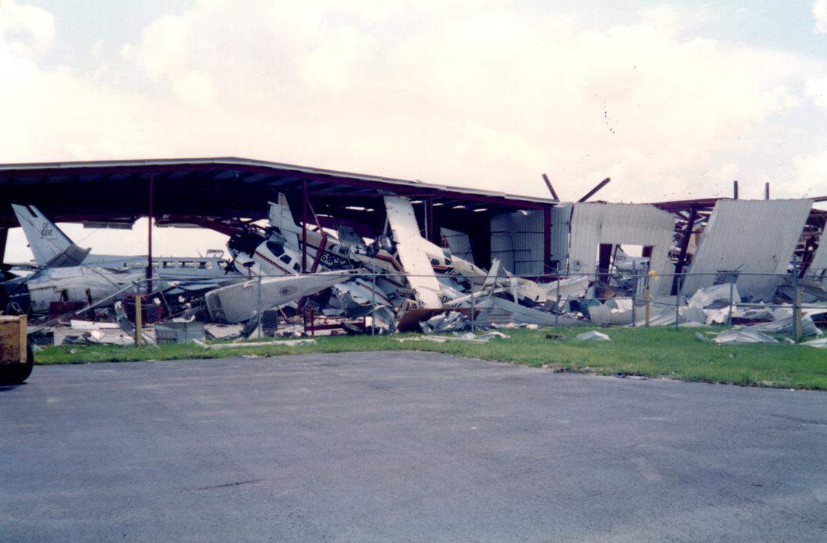 Hurricane Andrew left a pile of smashed and destroyed planes at Kendall-Tamiami Executive Airport in August 1992.