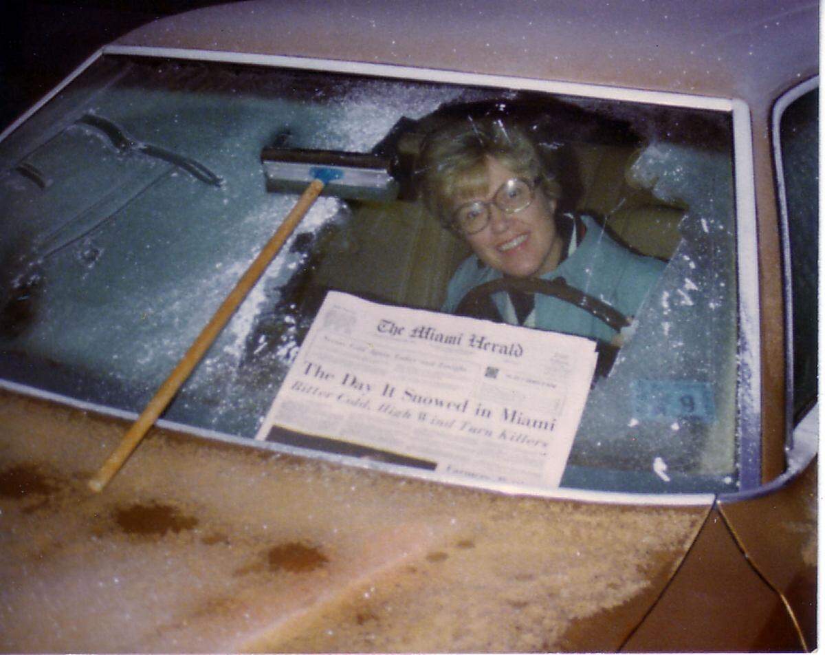 Joan Thompson of South Miami poses for her husband, Ferris, outside their home on the day after snow fell, Jan 20, 1977. The couple got up early hoping there would be a repeat of snow - but no luck. Note the frost on the windshield and that morning’s Miami Herald with the headline: “The day it snowed in Miami”.