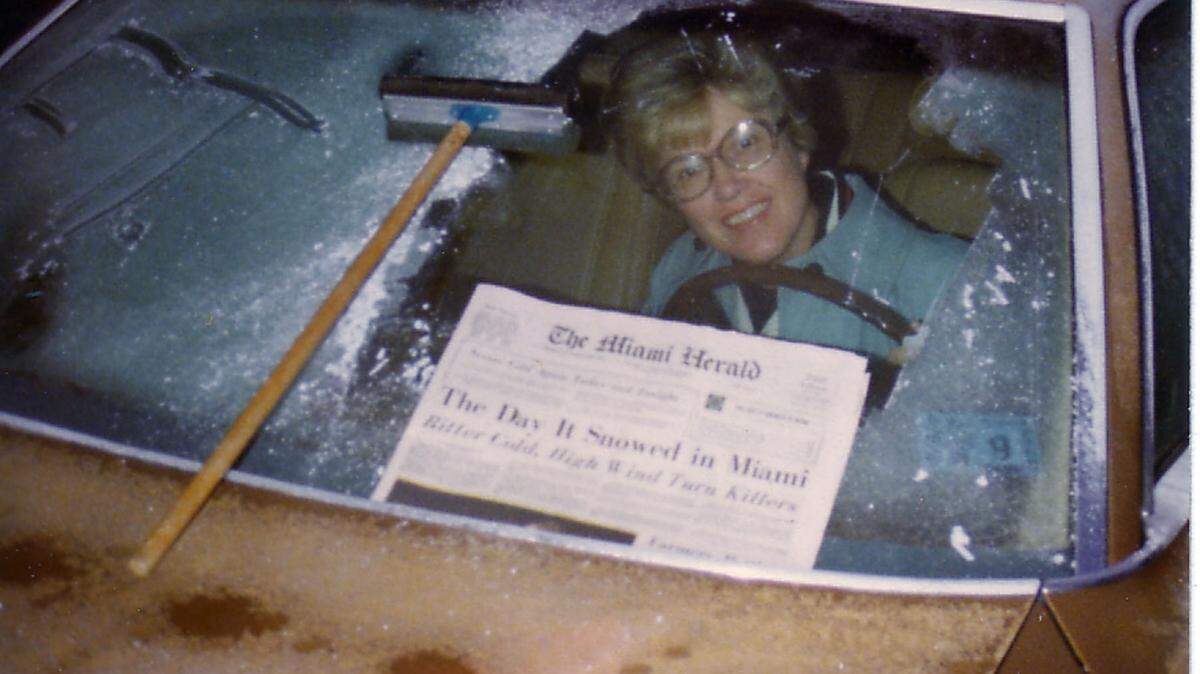 Joan Thompson of South Miami poses for her husband, Ferris, outside their home on the day after snow fell, Jan 20, 1977. The couple got up early hoping there would be a repeat of snow - but no luck. Note the frost on the windshield and that morning’s Miami Herald with the headline: “The day it snowed in Miami”.
