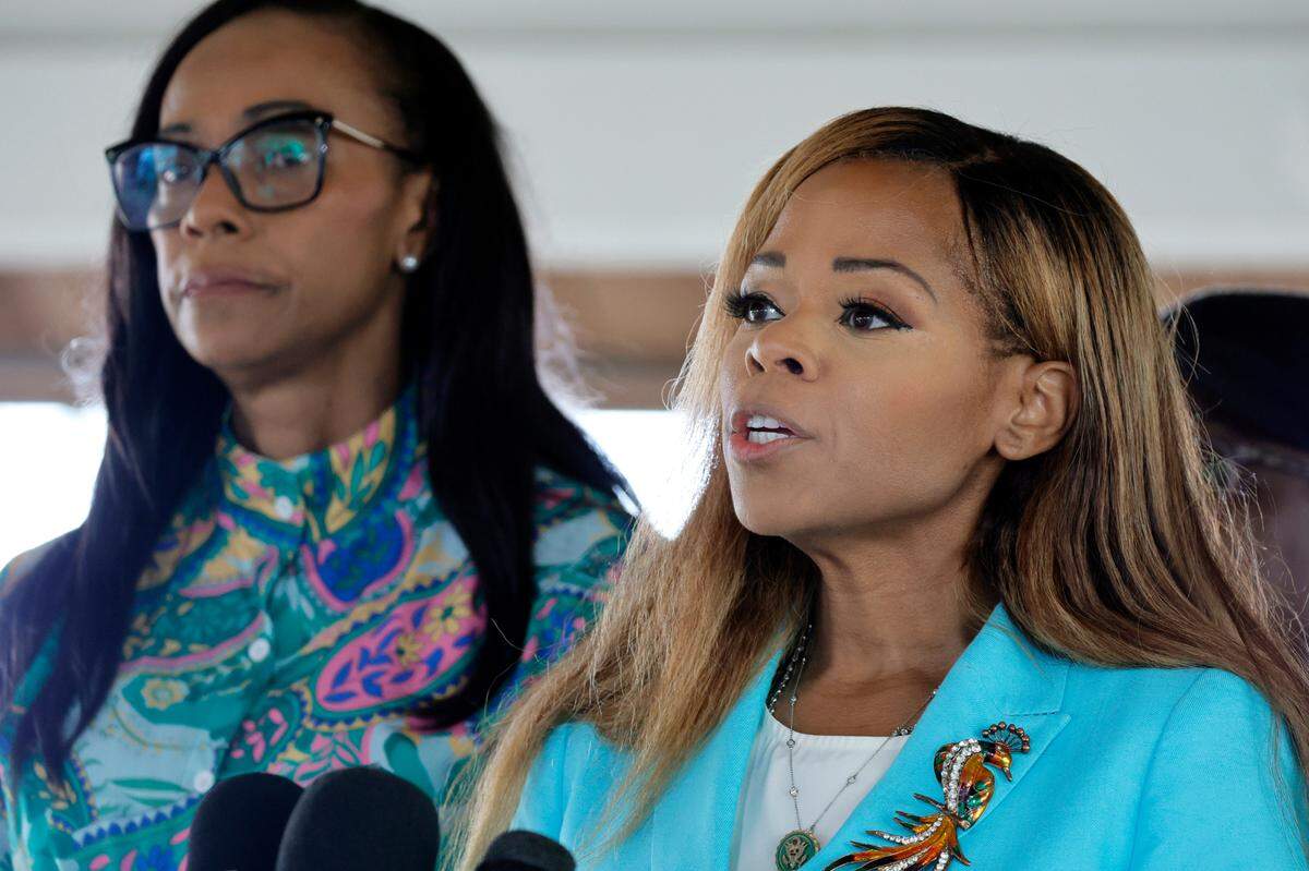 Congresswoman Sheila Cherfilus-McCormick, right, stands with Florida state Sen, Rosalyn Osgood, speaks during a news conference held at Lincoln Park in Fort Lauderdale on Wednesday, Sept. 4, 2024, to discuss the recent spate of shootings impacting the northwestern section of the city. (Amy Beth Bennett / South Florida Sun Sentinel)
