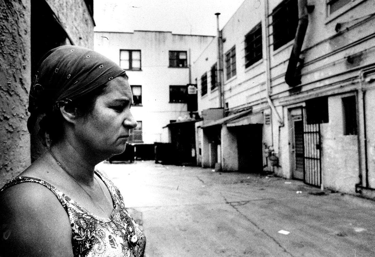 A woman surveys the street scene in Wynwood.
