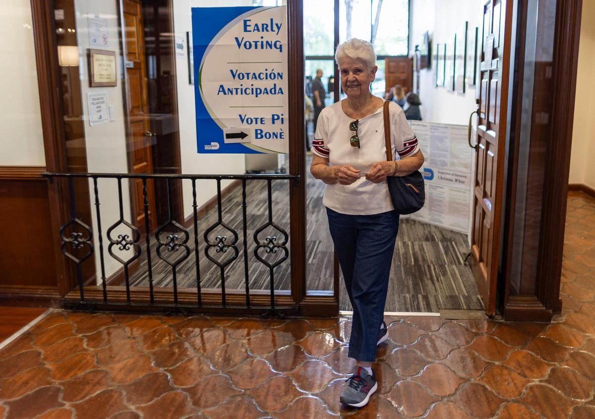 Silvia Perez, 81, leaves her precinct after casting her ballot during early in-person voting at the Coral Gables Library on Monday, March 4, 2024, in Coral Gables, Fla.