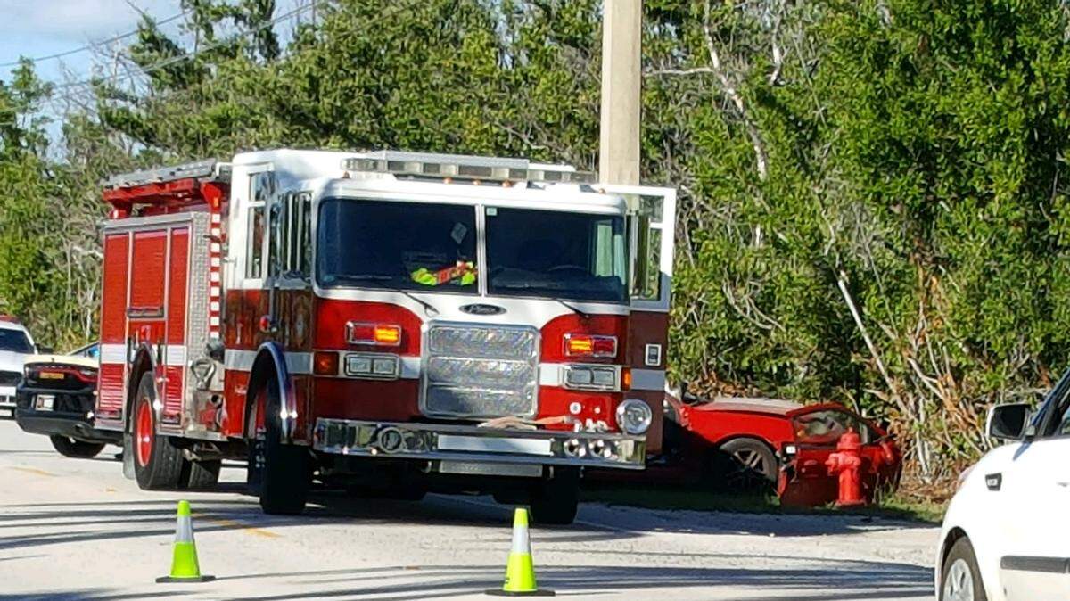 First responders investigate a fatal car crash on Saturday, Oct. 20, 2018.