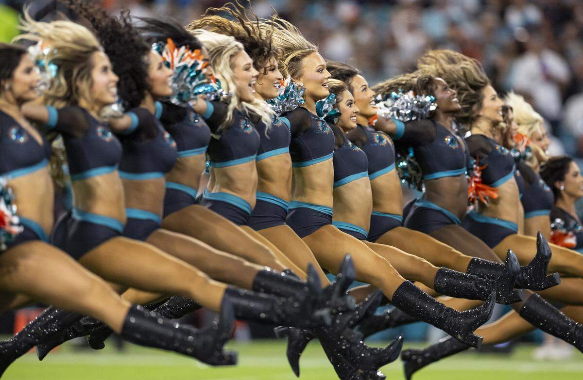 A Miami Dolphins cheerleaders perform as their team plays against the New York Jets in the second half of their NFL game at Hard Rock Stadium on Monday, Sept. 29, 2025, in Miami Gardens, Fla.