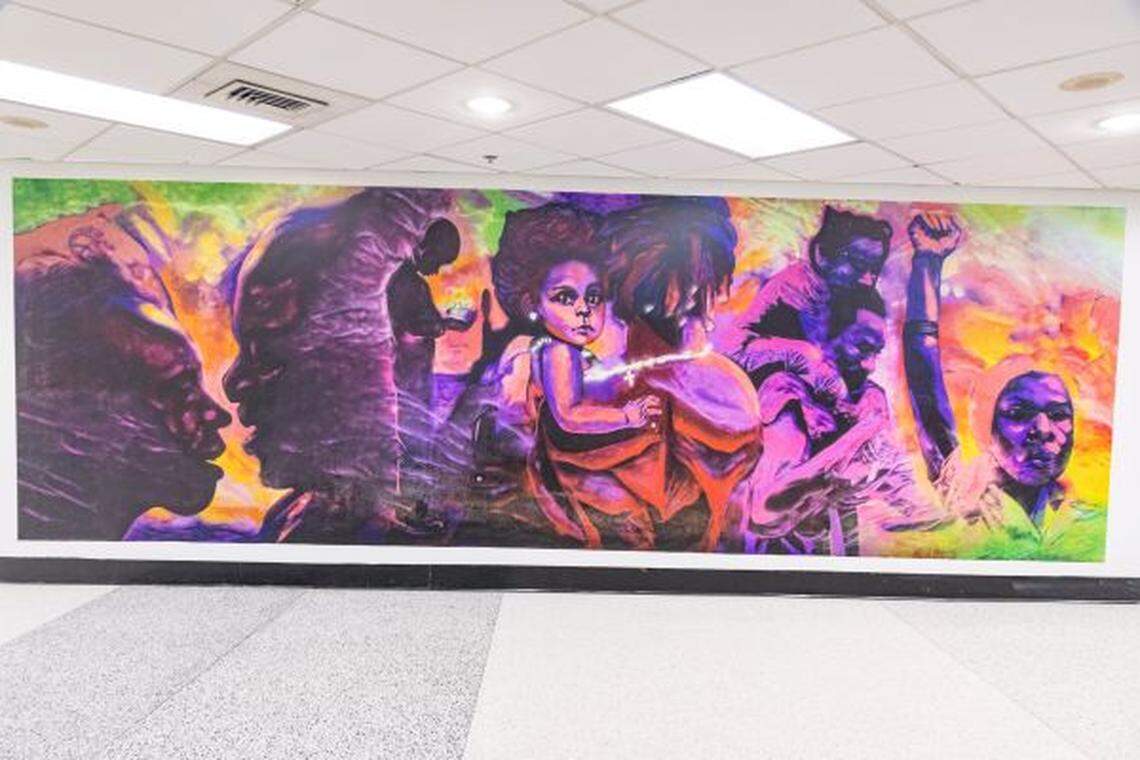 Miami Museum of Contemporary Art of the African Diaspora’s exhibit Telling Overtown Stories, Saying Their Names, will be at the Miami International Airport until Oct.13. This mural, “Overtown Our Family Tree,” also is on the building that served as the former law offices of Miami’s first Black judge Lawson Thomas.