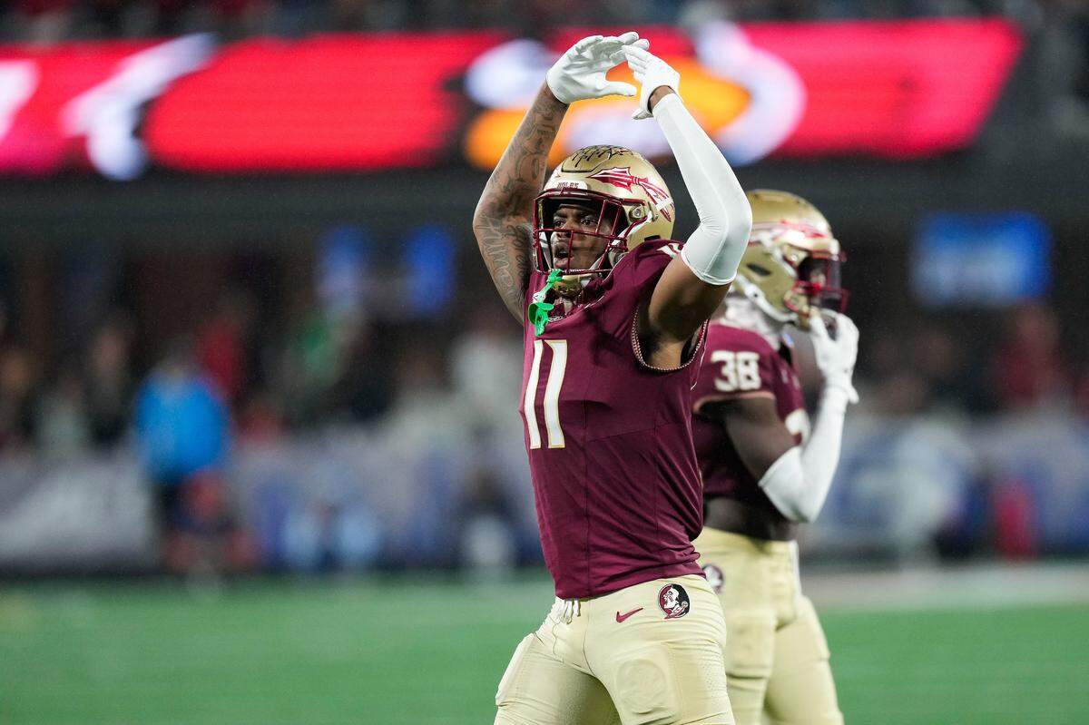 Dec 2, 2023; Charlotte, NC, USA; Florida State Seminoles defensive lineman Patrick Payton (11) reacts during the fourth quarter against the Louisville Cardinals at Bank of America Stadium.