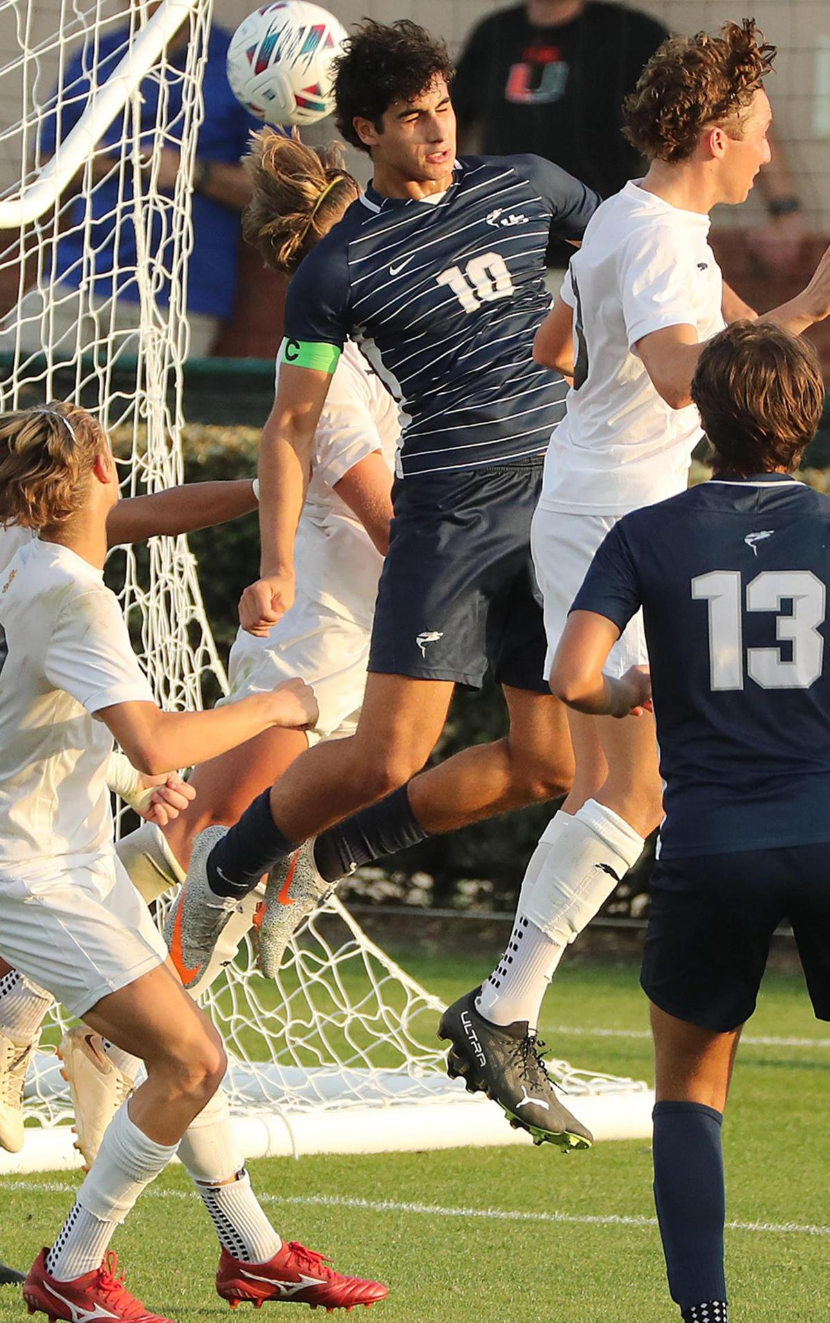 NSU player Rafael Guerra (10) heads the ball during the FHSAA Class 3A state championship game of Trinity Prep versus NSU University School at Spec Martin Stadium in DeLand on Thursday, February 23, 2023. Trinity Prep won won the match on overtime penalty kicks to claim the state championship. (Stephen M. Dowell/Orlando Sentinel)