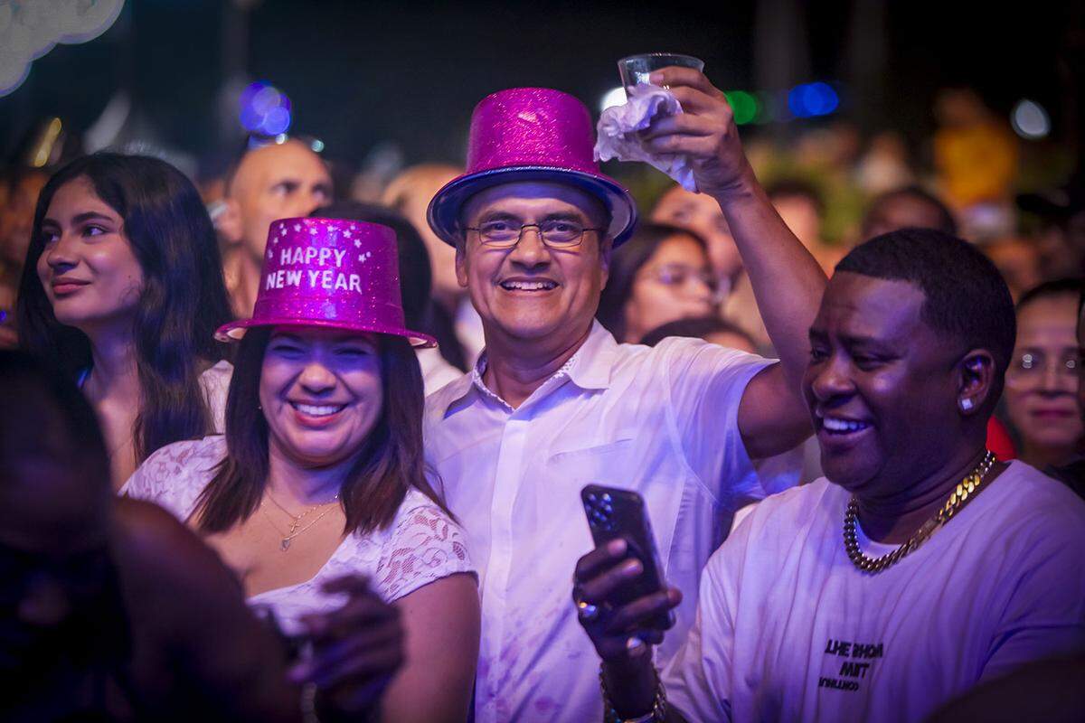 People dance and sing along during the celebration at Bayfront Park.