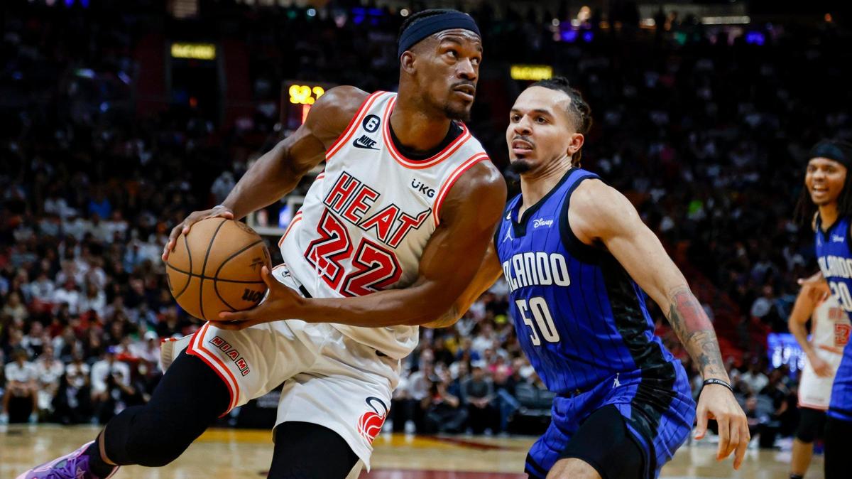 Miami Heat forward Jimmy Butler (22) goes up against Orlando Magic guard Cole Anthony (50) in the second quarter at Miami-Dade Arena in Miami on Friday, January 27, 2023.